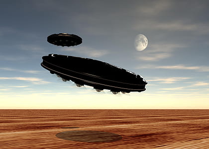 black UFO discs flying above desert photo thumbnail