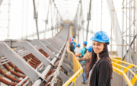 woman stand on yellow and white bridge thumbnail