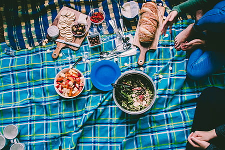 two person sitting in front of containers with food thumbnail