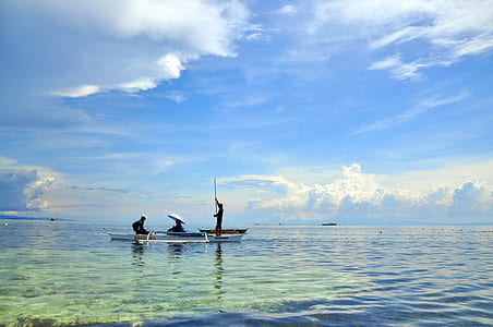 three people riding on a boat thumbnail