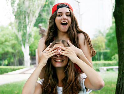 woman in red cap thumbnail
