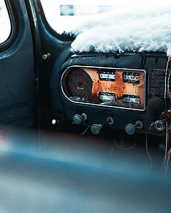 person sitting inside car thumbnail