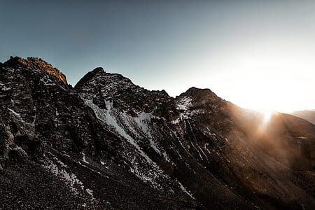 silhouette of brown rocky mountain thumbnail