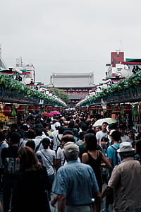people walking through temple thumbnail