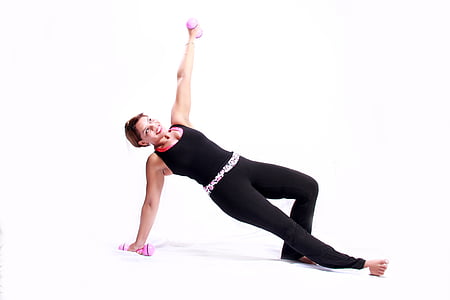 woman holding dumbbells thumbnail