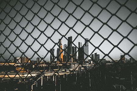 high-rise buildings near body of water thumbnail