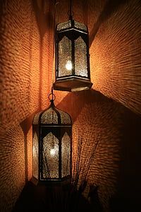 two turned on candle lanterns thumbnail