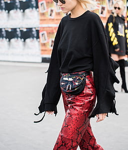 shallow focus photo of woman in black long-sleeved shirt during day thumbnail