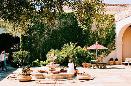 white patio umbrella on table thumbnail