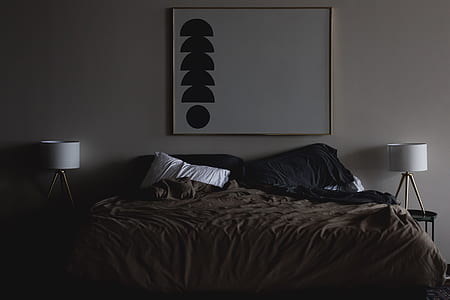 pillows on empty bed thumbnail