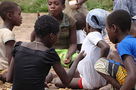 group of children lying on ground thumbnail