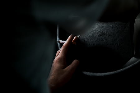 person holding cigarette thumbnail