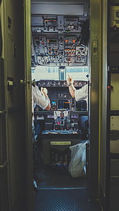 two pilot inside plane thumbnail