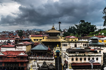 top view photography of houses during gray clouds thumbnail