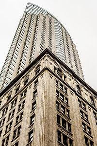 brown painted building during cloudy day thumbnail