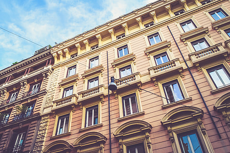 Wide-angle shot of street houses in Italy thumbnail