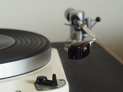 black and silver vinyl player near wall thumbnail