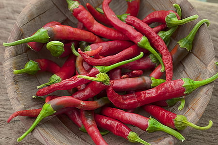 red chili lot on round brown bowl thumbnail