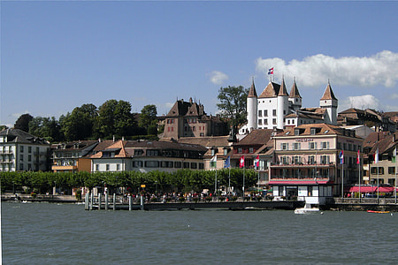 Shoreline Buildings with castle in Nyon, Switzerland thumbnail