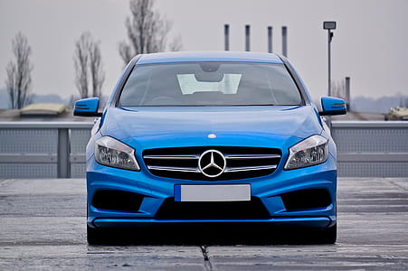 Blue Mercedes Benz Car Parked thumbnail