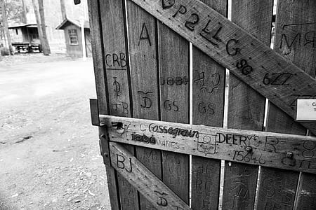 Gray Scale Photo of Brown Wooden Gate thumbnail
