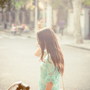 woman wearing teal top thumbnail