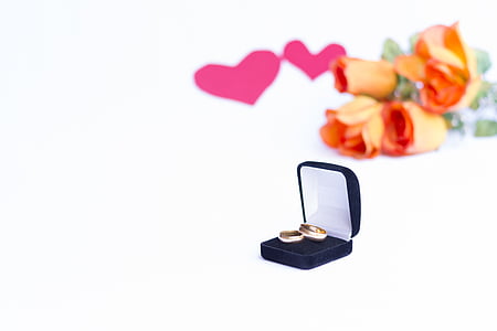gold-colored wedding rigs in box thumbnail