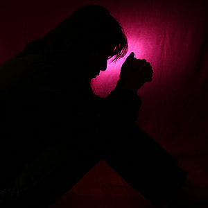 Person's Silhouette on red textile thumbnail