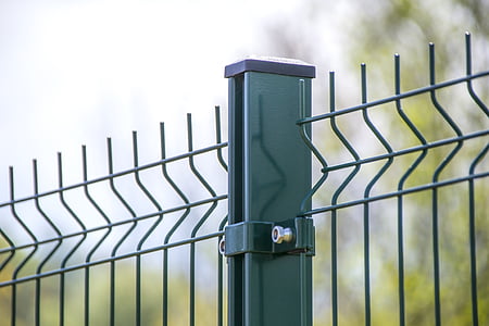 green metal gate at daytime thumbnail
