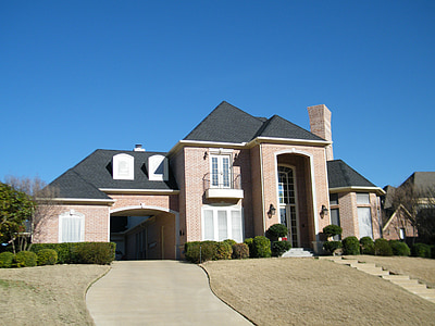 brown and gray concrete house thumbnail