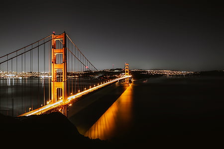 time lapse photography of golden gate during night thumbnail