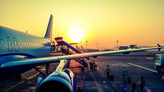 Photography of Airplane during Sunrise thumbnail