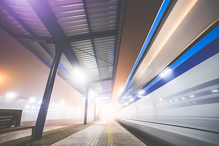 Train Leaving The Railway Station At Night thumbnail
