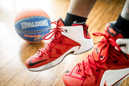 red-and-white Nike basketball shoes thumbnail