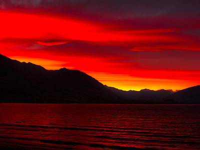 silhouette of mountain at golden hour thumbnail