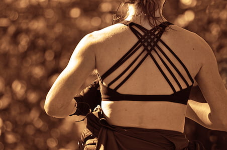 woman in black sports bra thumbnail