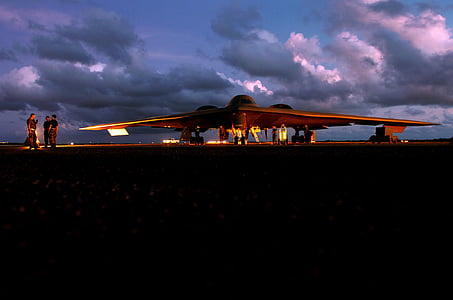 three men standing beside jet fighter thumbnail