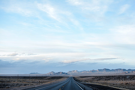Road and mountains with sky landscape thumbnail