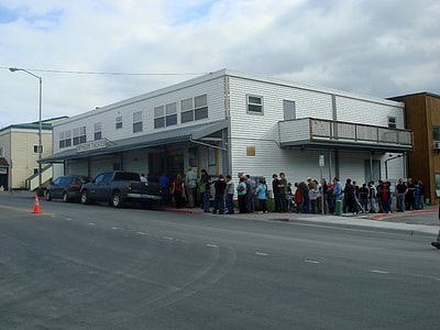 Customers line up in front of the Orpheum Theater in Kodiak, Alaska thumbnail