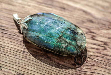 oval blue and black stone pendant thumbnail