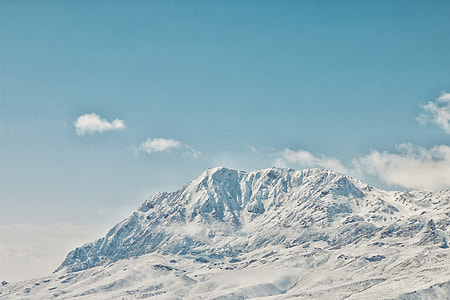 mountain peak under blue sky thumbnail