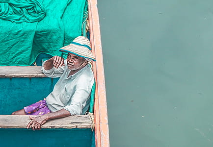 wood, man, water, boat thumbnail
