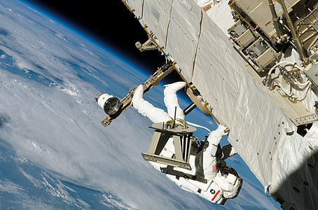 astronaut on spacecraft thumbnail