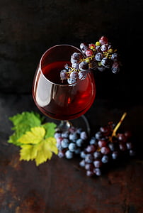 closeup photo of cup of wine with berries thumbnail