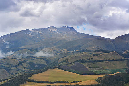 green mountain under nimbus clouds thumbnail