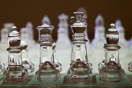 selective focus photography of glass chess board thumbnail