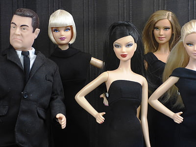 four female and one male toy dolls thumbnail