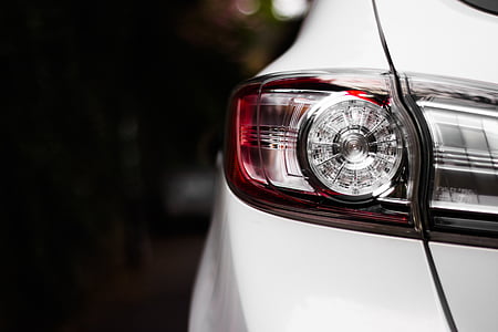 selective focus photography of turned-off white vehicle taillight thumbnail