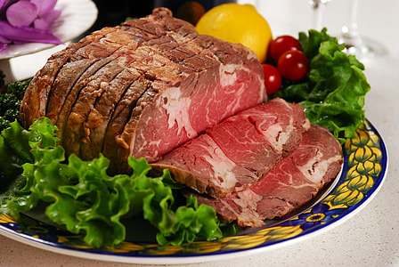 closeup photography of rare cooked ham on plate with lettuce thumbnail