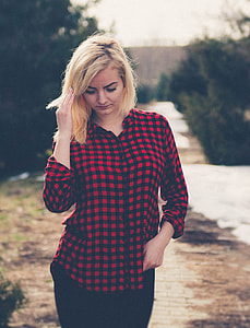 woman holding her hair thumbnail